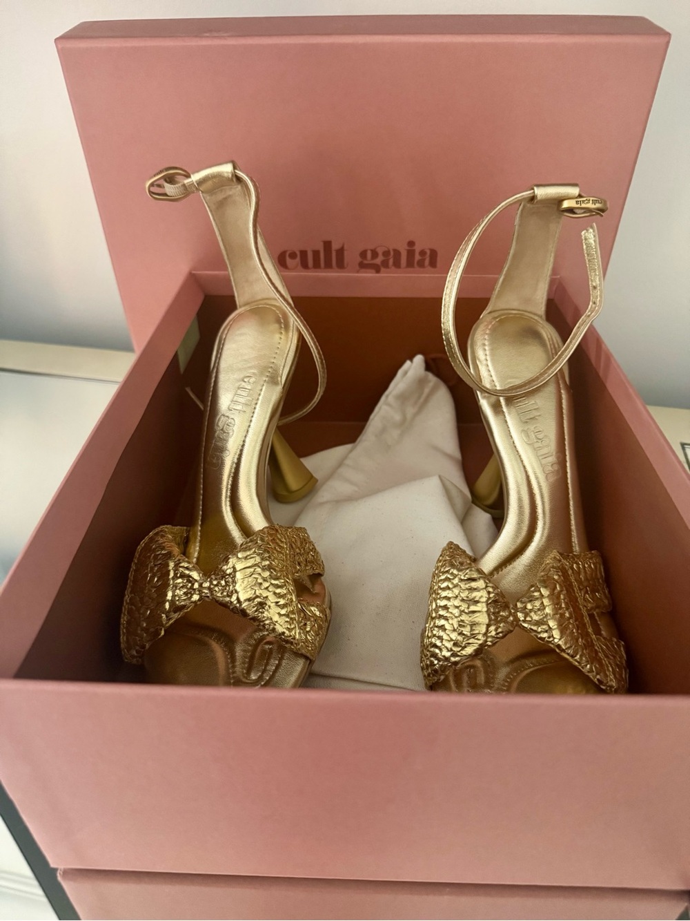 cult gaia Metallic Gold Textured Bow Ankle-Strap Heels